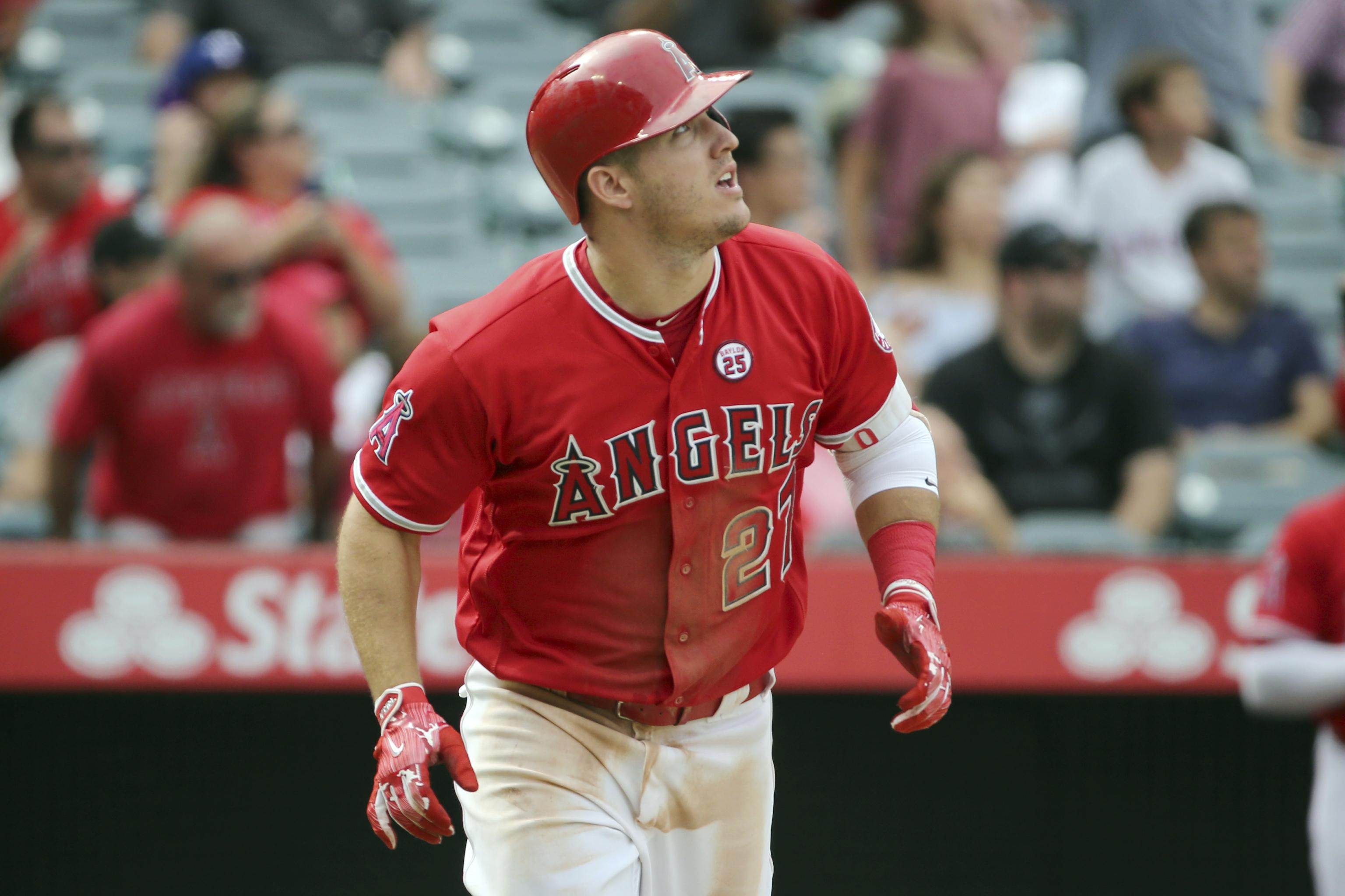 This is Mike Trout swinging a bat at a beer can in April issue of GQ - MLB  Daily Dish