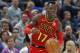Atlanta Hawks guard Dennis Schroder (17) brings the ball up court in the second half during an NBA basketball game against the Utah Jazz Tuesday, March 20, 2018, in Salt Lake City. (AP Photo/Rick Bowmer)