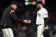 SAN FRANCISCO, CA - JUNE 18: Manager Bruce Bochy takes out Hunter Strickland #60 of the San Francisco Giants after he gave up a hit to Miguel Rojas #19 of the Miami Marlins that scored the go-ahead run in the bottom of the ninth inning against the San Francisco Giants at AT&T Park on June 18, 2018 in San Francisco, California. (Photo by Ezra Shaw/Getty Images)