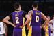 LOS ANGELES, CA - MARCH 28: Kyle Kuzma #0 and Lonzo Ball #2 of the Los Angeles Lakers wait on the court during a time out in the game against the Dallas Mavericks at Staples Center on March 28, 2018 in Los Angeles, California. (Photo by Jayne Kamin-Oncea/Getty Images) NOTE TO USER: User expressly acknowledges and agrees that, by downloading and or using this photograph, User is consenting to the terms and conditions of the Getty Images License Agreement.