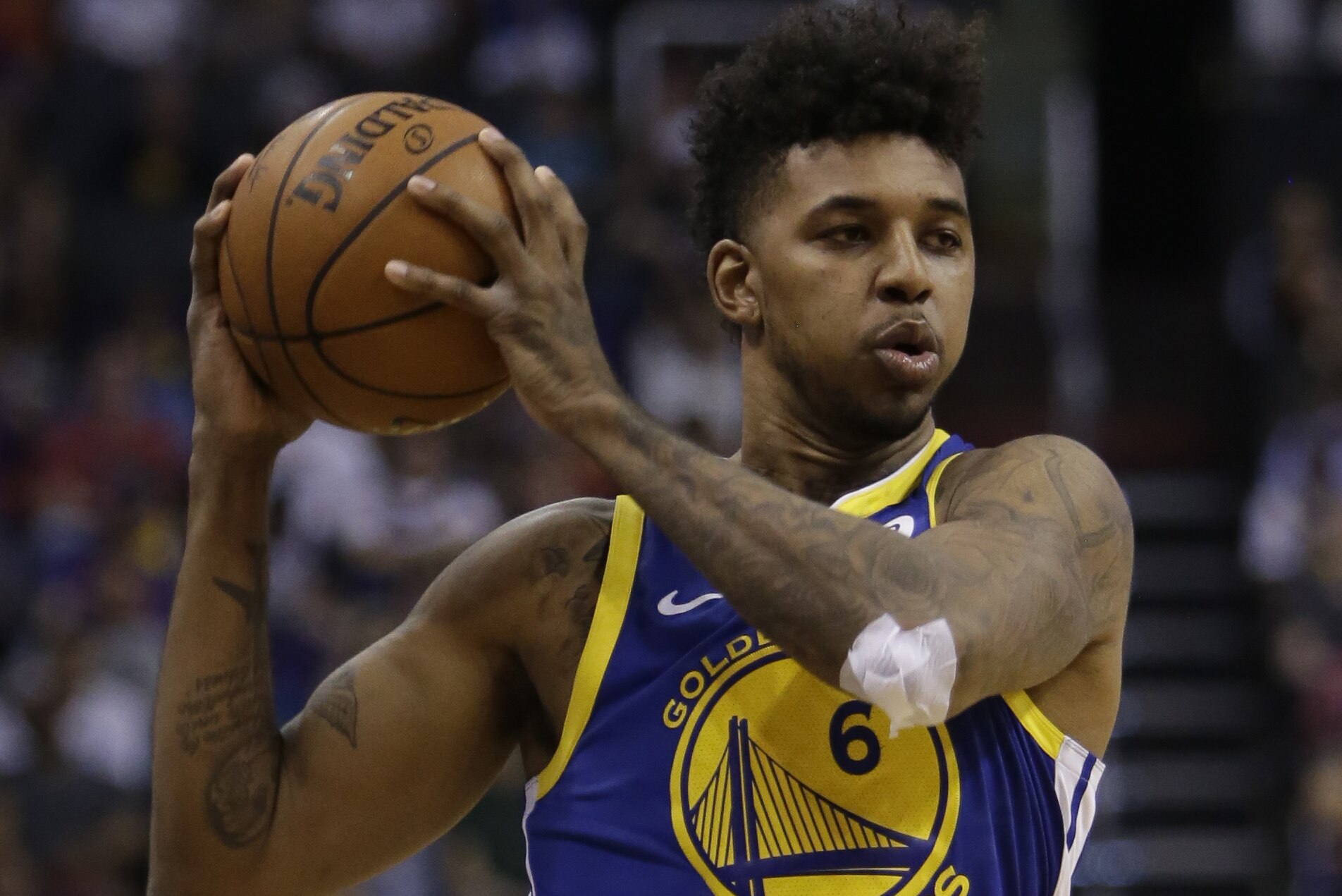 Golden State Warriors guard Nick Young (6) in the second half during an NBA basketball game against the Phoenix Suns, Sunday, April 8, 2018, in Phoenix. The Warriors defeated the Suns 117-100. (AP Photo/Rick Scuteri)
