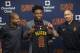 Collin Sexton, center, presents his jersey with Cavaliers general manager Koby Altman, left, and Tyronn Cavaliers head coach Lue at a press conference at the Canadian Forces Training Center. Riders in Independence, Ohio on Friday, June 22, 2018. (AP Photo / Phil Long)