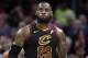 Cleveland Cavaliers' LeBron James looks up at the scoreboard during the first half against the Golden State Warriors in Game 3 of basketball's NBA Finals, Wednesday, June 6, 2018, in Cleveland. (AP Photo/Tony Dejak)
