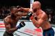 SINGAPORE - JUNE 23: (R-L) Donald Cerrone and Leon Edwards of Jamaica trade punches in their welterweight bout during the UFC Fight Night event at the Singapore Indoor Stadium on June 23, 2018 in Singapore. (Photo by Jeff Bottari/Zuffa LLC/Zuffa LLC via Getty Images)