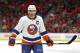 New York Islanders center John Tavares plays against the Detroit Red Wings in the first period of an NHL hockey game Saturday, April 7, 2018, in Detroit. (AP Photo/Paul Sancya)