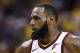 Cleveland Cavaliers forward LeBron James' eye is shown during the first half of Game 2 of basketball's NBA Finals between the Golden State Warriors and the Cleveland Cavaliers in Oakland, Calif., Sunday, June 3, 2018. (AP Photo/Marcio Jose Sanchez)