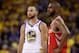 OAKLAND, CA - MAY 20: Stephen Curry #30 of the Golden State Warriors stands next to Chris Paul #3 of the Houston Rockets during Game Three of the Western Conference Finals at ORACLE Arena on May 20, 2018 in Oakland, California. NOTE TO USER: User expressly acknowledges and agrees that, by downloading and or using this photograph, User is consenting to the terms and conditions of the Getty Images License Agreement. (Photo by Ezra Shaw/Getty Images)