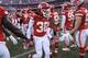 Kansas City Chiefs free safety Ron Parker (38) is greeted onto the field by teammates prior to the start of their NFL wild-card playoff game in Kansas City, Mo., Saturday, Jan. 6, 2018. (AP Photo/Reed Hoffmann)