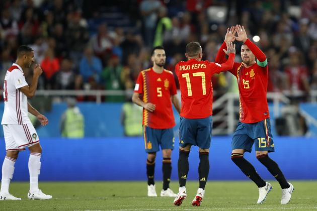 KALININGRAD, RUSSIA - JUNE 25:  Iago Aspas of Spain celebrates with teammate Sergio Ramos after scoring his team's second goal during the 2018 FIFA World Cup Russia group B match between Spain and Morocco at Kaliningrad Stadium on June 25, 2018 in Kaliningrad, Russia.  (Photo by Julian Finney/Getty Images)