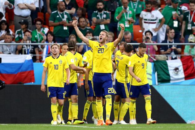 YEKATERINBURG, RUSSIA - JUNE 27:  Andreas Granqvist of Sweden celebrates with teammates after scoring his team's second goal during the 2018 FIFA World Cup Russia group F match between Mexico and Sweden at Ekaterinburg Arena on June 27, 2018 in Yekaterinburg, Russia.  (Photo by Ryan Pierse/Getty Images)