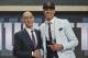 Missouri's Michael Porter Jr., right, poses with NBA Commissioner Adam Silver after he was picked 14th overall by the Denver Nuggets during the NBA basketball draft in New York, Thursday, June 21, 2018. (AP Photo/Kevin Hagen)