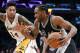 Kawhi Leonard of San Antonio Spurs misses Brandon Ingram of the Los Angeles Lakers in the second half of an NBA basketball game on Sunday, February 26, 2017 in Los Angeles. (AP Photo / Jae C. Hong)
