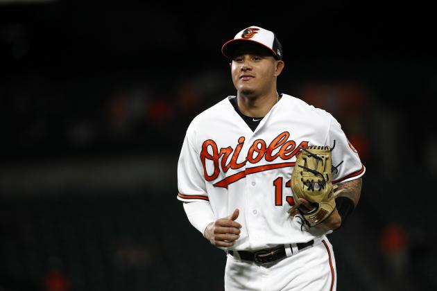 Baltimore Orioles shortstop Manny Machado jogs off the field between innings of a baseball game against the Seattle Mariners, Monday, June 25, 2018, in Baltimore. (AP Photo/Patrick Semansky)