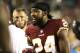 Washington Redskins cornerback Josh Norman talks with teammates on the bench during an NFL football game between the Oakland Raiders and Washington Redskins, Sunday, Sept. 24, 2017, in Landover, Md. (AP Photo/Mark Tenally)
