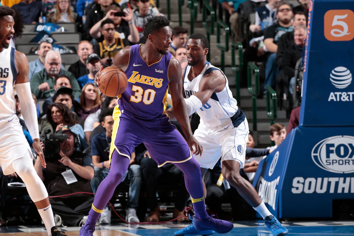 lakers news evaluating decision  extend qualifying offer  julius