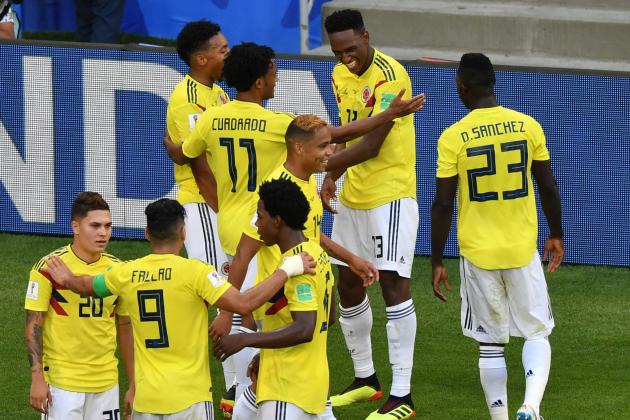 Colombia's defender Yerry Mina (rear R) celebrates with teammates after scoring a goal during the Russia 2018 World Cup Group H football match between Senegal and Colombia at the Samara Arena in Samara on June 28, 2018. (Photo by Fabrice COFFRINI / AFP) / RESTRICTED TO EDITORIAL USE - NO MOBILE PUSH ALERTS/DOWNLOADS (Photo credit should read FABRICE COFFRINI/AFP/Getty Images)