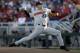 Oregon State's Kevin Abel (23) works against Arkansas during the fourth inning in Game 3 of the NCAA College World Series baseball finals in Omaha, Neb., Thursday, June 28, 2018. (AP Photo/Nati Harnik)