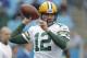 Green Bay Packers' Aaron Rodgers (12) warms up before an NFL football game against the Carolina Panthers in Charlotte, N.C., Sunday, Dec. 17, 2017. (AP Photo/Bob Leverone)