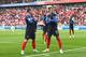 TOPSHOT - France striker Kylian Mbappe (R) celebrates on 21 June 2018 with his teammate Antoine Griezmann in the Russia Football World Cup Group C match between France and Peru in the Ekaterinburg Arena in Ekaterinburg the first goal. (Photo by Anne-Christine POUJOULAT / AFP) / SECURED FOR EDITOR USE - NO MOBILE PUSH ALERTS / DOWNLOADS (Photo Credit Should Read ANNE-CHRISTINE POUJOULAT / AFP / Getty Images)