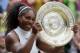 Serena Williams of the U.S holds up her trophy after beating Angelique Kerber of Germany in the women's singles final on day thirteen of the Wimbledon Tennis Championships in London, Saturday, July 9, 2016. (AP Photo/Tim Ireland)