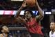 Portland Trail Blazers forward Ed Davis (17) controls the ball between Memphis Grizzlies guard Wayne Selden (7) and center Deyonta Davis (21) in the second half of an NBA basketball game Wednesday, March 28, 2018, in Memphis, Tenn. (AP Photo/Brandon Dill)