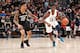 SALT LAKE CITY - JULY 2: Jaren Jackson Jr. #13 of the handles the ball against Jason Collins #20 of the Atlanta Hawks during the 2018 Summer League at the Vivint Smart Home Arena on July 2, 2018 in Salt Lake CIty, Utah. NOTE TO USER: User expressly acknowledges and agrees that, by downloading and or using this photograph, User is consenting to the terms and conditions of the Getty Images License Agreement. Mandatory Copyright Notice: Copyright 2018 NBAE (Photo by Joe Murphy/NBAE via Getty Images)