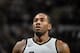 SAN ANTONIO, TX - JANUARY 13: Kawhi Leonard #2 of the San Antonio Spurs looks on during the game against the Denver Nuggets on January 13, 2018 at the AT&T Center in San Antonio, Texas. NOTE TO USER: User expressly acknowledges and agrees that, by downloading and or using this photograph, user is consenting to the terms and conditions of the Getty Images License Agreement. Mandatory Copyright Notice: Copyright 2018 NBAE (Photos by Mark Sobhani/NBAE via Getty Images)
