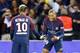 Paris Saint Germain's Kylian Mbappe, right, reacts with Neymar after he scored the second goal against Lyon during their French League One soccer match between PSG and Olympique Lyon at the Parc des Princes stadium in Paris, France, Sunday, Sept. 17, 2016. (AP Photo/Francois Mori)
