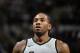   SAN ANTONIO, TX - JANUARY 13: Kawhi Leonard # 2 of the San Antonio Spurs watches during the game against the Denver Nuggets on January 13, 2018 at the AT & T Center in San Antonio, Texas. NOTE TO THE USER: The user acknowledges and expressly agrees that by downloading and using this photo, the user agrees to the terms and conditions of the Getty Images License Agreement. Mandatory Copyright Notice: Copyright 2018 NBAE (Photos by Mark Sobhani / NBAE via Getty Images) 