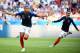  TOPSHOT - France's forward Kylian Mbappe (L) celebrates past France's forward Antoine Griezmann after scoring their fourth goal during the 2018 World Cup round of 16 football match between France and Argentina at the Kazan Arena in Kazan on June 30, 2018. (Photo by FRANCK FIFE / AFP) / RESTRICTED TO EDITORIAL USE - NO MOBILE PUSH ALERTS / DOWNLOADS (Photo credit should read FRANCK FIFE / AFP / Getty Images) 