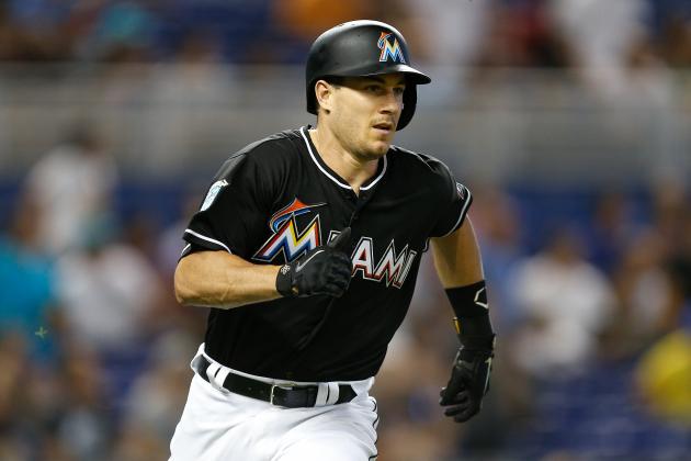 MIAMI, FL - JUNE 30:  J.T. Realmuto #11 of the Miami Marlins runs after hitting a 2-RBI double in the sixth inning against the New York Mets at Marlins Park on June 30, 2018 in Miami, Florida.  (Photo by Michael Reaves/Getty Images)