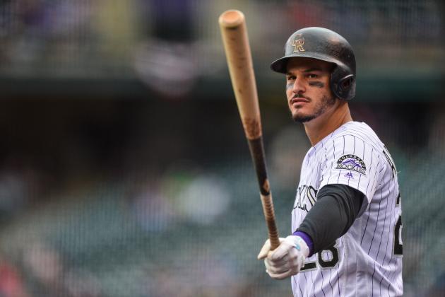 DENVER, CO - JUNE 24: Nolan Arenado #28 of the Colorado Rockies prepares to bat against the Miami Marlins int he first inning of a game at Coors Field on June 24, 2018 in Denver, Colorado.  (Photo by Dustin Bradford/Getty Images)