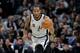 FILE - In this Jan. 13, 2018, file photo, San Antonio Spurs forward Kawhi Leonard (2) moves the ball up court during the second half of an NBA basketball game against the Denver Nuggets, in San Antonio. The absolute unwillingness to answer certain questions is part of the San Antonio Spurs' mystique. The Spurs just don't share much. So there is some unmistakable irony here that when it comes to the obviously fractured relationship between San Antonio and Kawhi Leonard, it's the Spurs who are the ones frustrated by the lack of answers. (AP Photo/Eric Gay, File)