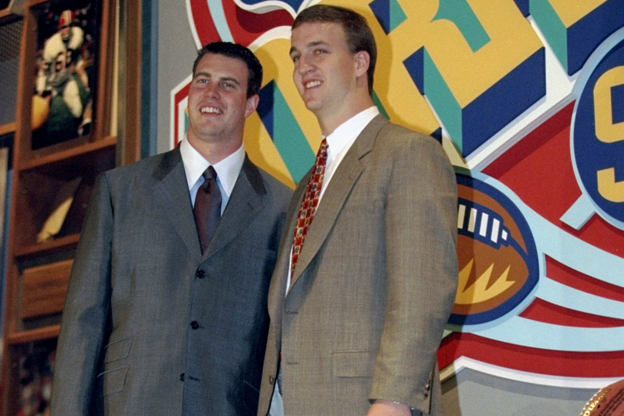 18 Apr 1998: Second overall pick Ryan Leaf (L) poses alongside first overall pick Peyton Manning (R) during the first round of the 1998 NFL Draft at Madison Square Garden in Manhattan, New York. Mandatory Credit: Jamie Squire /Allsport