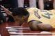 Utah Jazz guard Donovan Mitchell reacts after injuring himself during the second half in Game 1 of an NBA basketball second-round playoff series, Sunday, April 29, 2018, in Houston. Mitchell remained in the game. Houston won 110-96. (AP Photo/Eric Christian Smith)
