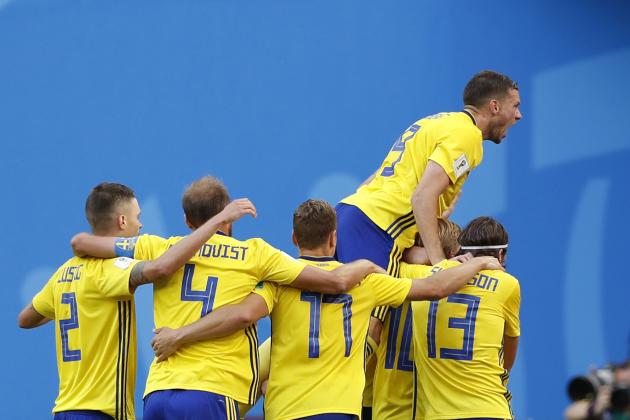 Sweden players celebrate after teammate Emil Forsberg scored their side's first goal during the round of 16 match between Switzerland and Sweden at the 2018 soccer World Cup in the St. Petersburg Stadium, in St. Petersburg, Russia, Tuesday, July 3, 2018. (AP Photo/Darko Bandic)