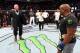 LAS VEGAS, NV - JULY 07: Brock Lesnar confronts Daniel Cormier in their UFC heavyweight championship fight during the UFC 226 event inside T-Mobile Arena on July 7, 2018 in Las Vegas, Nevada. (Photo by Josh Hedges/Zuffa LLC/Zuffa LLC via Getty Images)