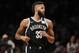 Brooklyn Nets guard Allen Crabbe (33) runs down court during the first half of an NBA basketball game against the Chicago Bulls, Monday, April 9, 2018, in New York. Crabbe had 41 points in the Nets 114-105 victory over the Bulls. (AP Photo/Kathy Willens)
