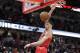 Chicago Bulls' Zach LaVine dunks the ball after stealing a pass intended for Orlando Magic's Shelvin Mack during the second half of an NBA basketball game Monday, Feb. 12, 2018, in Chicago. Bulls won 105-101. (AP Photo/Charles Rex Arbogast)