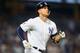 NEW YORK, NY - JULY 03: Giancarlo Stanton #27 of the New York Yankees hits a 2-run home run in the bottom of the eighth inning against the Atlanta Braves at Yankee Stadium on July 3, 2018 in the Bronx borough of New York City. (Photo by Mike Stobe/Getty Images)