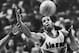 FILE - In this Dec. 25, 1979, file photo, Portland Trail Blazers' Kermit Washington gains control of a loose ball during an NBA basketball game against the Golden State Warriors in Portland, Ore. Washington, who notoriously gave a bone-breaking face punch to the Houston Rockets' Rudy Tomjanovich during a 1977 Lakers game, has been arrested by federal agents. Washington was arrested on a warrant Tuesday, May 24, 2016, in Los Angeles. Officials won't discuss the arrest, but they have set a news conference for Wednesday in Kansas City, Mo. (AP Photo/Jack Smith, File)