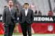 GLENDALE, AZ - OCTOBER 04: (L-R) Head coach Bruce Arians of the Arizona Cardinals, general manager Steve Keim, and president Michael J. Bidwell watch warmups before the start of the NFL game against the St. Louis Rams at the University of Phoenix Stadium on October 4, 2015 in Glendale, Arizona. (Photo by Christian Petersen/Getty Images)
