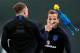 England's forward Harry Kane (R) looks on as defender Phil Jones (L) tries to catch a toy rooster as they take part in a training session in Repino on July 10, 2018 ahead of their semi-final match against Croatia during the Russia 2018 World Cup football tournament. (Photo by ADRIAN DENNIS / AFP) (Photo credit should read ADRIAN DENNIS/AFP/Getty Images)