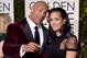 Dwayne Johnson, left, and Simone Alexandra Johnson arrives at the 73rd annual Golden Globe Awards on Sunday, Jan. 10, 2016, at the Beverly Hilton Hotel in Beverly Hills, Calif. (Photo by Jordan Strauss/Invision/AP)