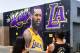 People photograph a mural of LeBron James in a Los Angeles Lakers jersey in Venice, California on July 9, 2018. - It was originally revealed July 6, 2018, and then vandalized over the weekend, and re-touched up again with the word 'of' not repainted from the original words 'the King of LA'. Artists Jonas Never and Menso One painted the mural to welcome LeBron James to Los Angeles, outside the Baby Blues BBQ resturant in Venice, California. (Photo by Frederic J. BROWN / AFP) / RESTRICTED TO EDITORIAL USE - MANDATORY MENTION OF THE ARTIST UPON PUBLICATION - TO ILLUSTRATE THE EVENT AS SPECIFIED IN THE CAPTION (Photo credit should read FREDERIC J. BROWN/AFP/Getty Images)