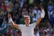 TOPSHOT - South Africa's Kevin Anderson celebrates after winning against Switzerland's Roger Federer during their men's singles quarter-finals match on the ninth day of the 2018 Wimbledon Championships at The All England Lawn Tennis Club in Wimbledon, southwest London, on July 11, 2018. - Anderson won the match 2-6, 6-7, 7-5, 6-4, 13-11. (Photo by Oli SCARFF / AFP) / RESTRICTED TO EDITORIAL USE (Photo credit should read OLI SCARFF/AFP/Getty Images)