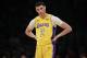 Los Angeles Lakers guard Lonzo Ball looks on during the first half of an NBA basketball game against the Denver Nuggets in Los Angeles, Tuesday, March 13, 2018. (AP Photo/Kelvin Kuo)