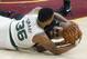 Cleveland Cavaliers' LeBron James, rear, and Boston Celtics' Marcus Smart battle for the ball during the second half of Game 6 of the NBA basketball Eastern Conference finals Friday, May 25, 2018, in Cleveland. The Cavaliers won 109-99. (AP Photo/Ron Schwane)