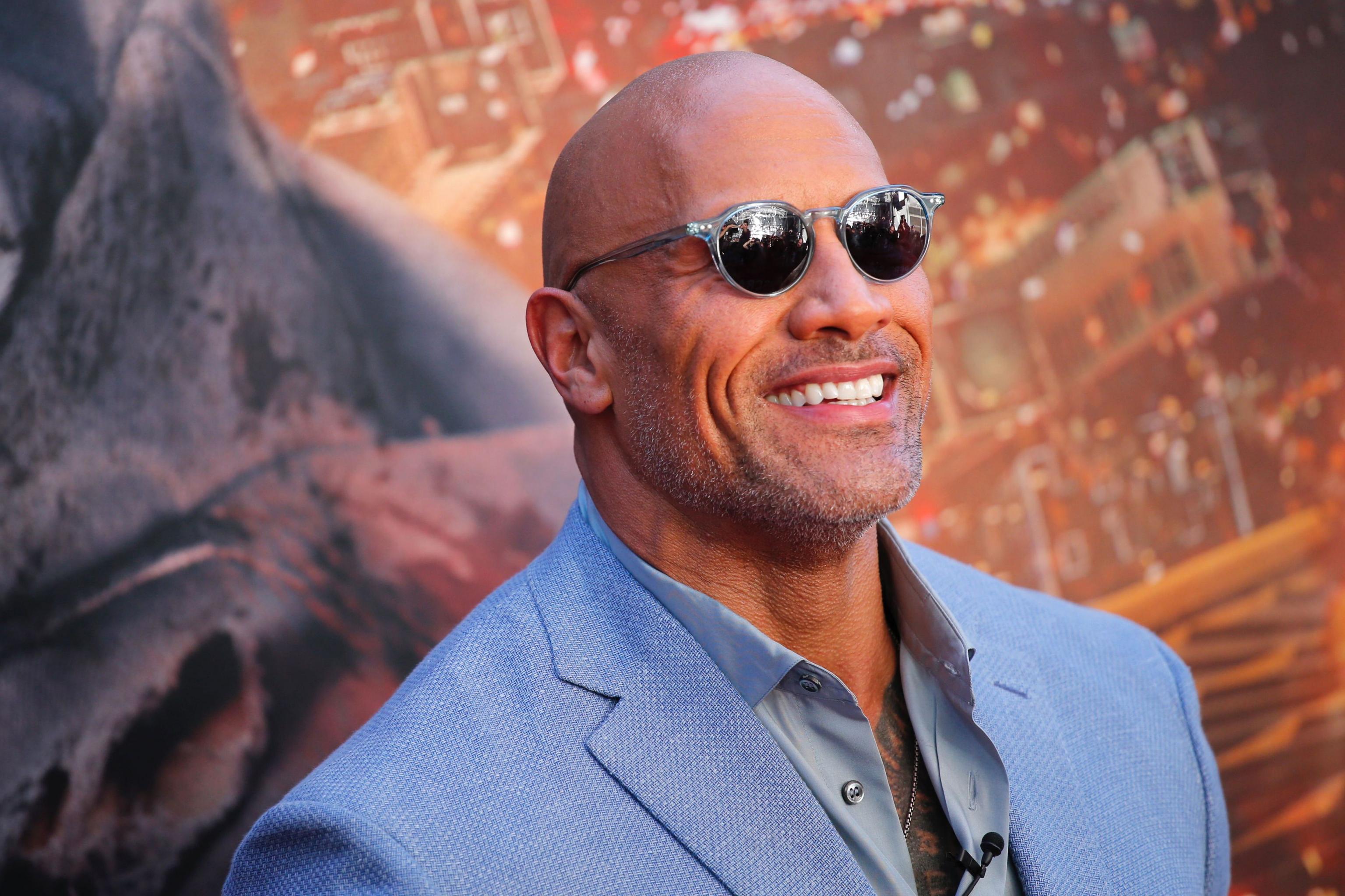 WWE: Dwayne 'The Rock' Johnson returns to the ring - BBC Newsround