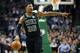 Boston Celtics' Marcus Smart signals during the first quarter of an NBA basketball game against the Indiana Pacers in Boston, Sunday, March 11, 2018. (AP Photo/Michael Dwyer)